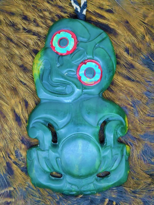 Large Flower Jade Hei Tiki on a Weka pelt