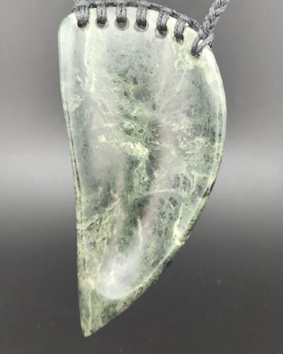 back of greenstone pendant